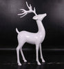 Holiday-Home-Decor-Ideas-Using-Life-Size-White-Reindeer-Statues LM Treasures