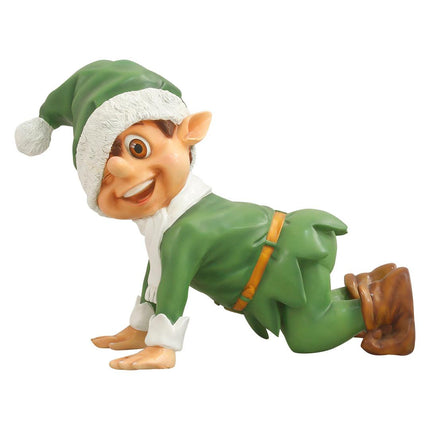 Green Elf Crawling Over Sized Statue