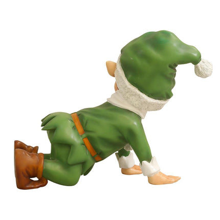 Green Elf Crawling Over Sized Statue