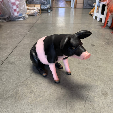 Baby Sitting Black And Pink Pig Life Size Statue