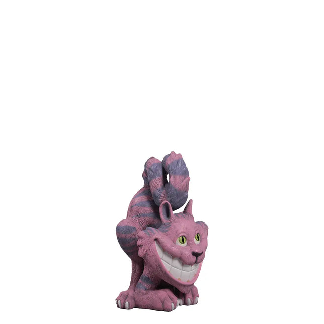 Pink and gray cat figurine on a white background
