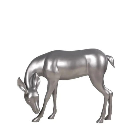 Metallic silver deer sculpture on a white background