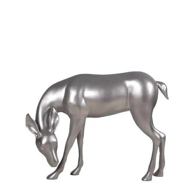 Metallic silver deer sculpture on a white background