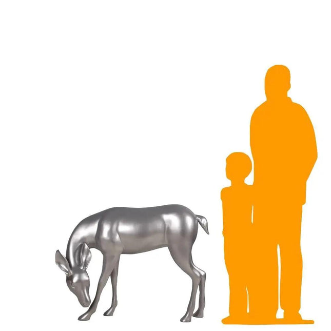 Metallic silver deer sculpture next to orange silhouette on a white background