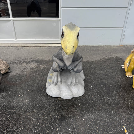Sitting Juvenile Theropod Dinosuar Life Size Statue