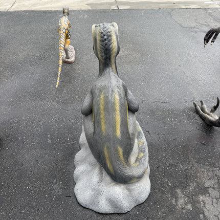 Sitting Juvenile Theropod Dinosuar Life Size Statue