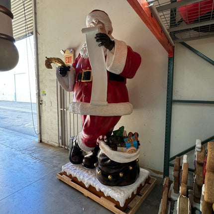 Giant Santa Claus With List Christmas Statue