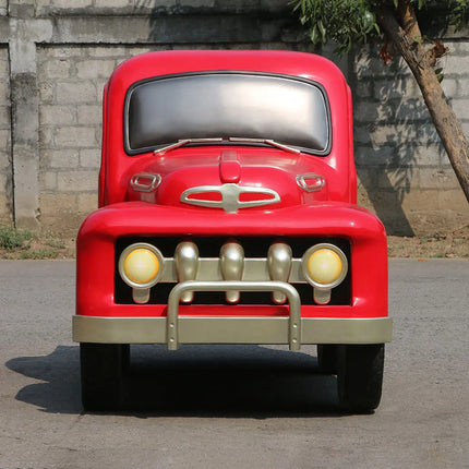 Red Vintage Pickup Truck with Christmas Gifts Statue