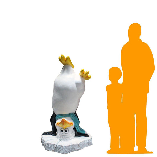 Comic Upside Down Penguin Statue