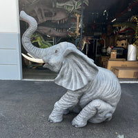 Baby Sitting Elephant Trunk Up With Tusks Statue - LM Treasures 