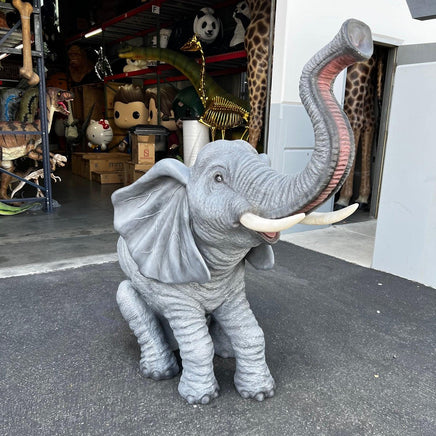 Baby Sitting Elephant Trunk Up With Tusks Statue - LM Treasures 