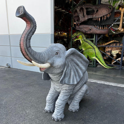 Baby Sitting Elephant Trunk Up With Tusks Statue - LM Treasures 